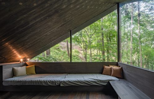 Inside a Japanese glass cabin designed for forest bathing